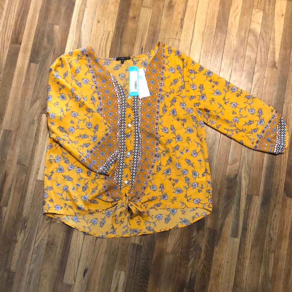 Golden yellow Kel Tai brand 3/4 length blouse with a floral pattern.